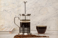 TEA & COFFEE PRESS